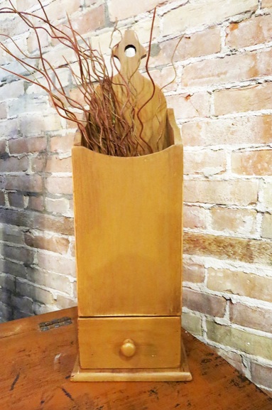 John and Kaye's daughter sells the work her parents do with their Woodmaster. Her online catalog describes this piece, "Handcrafted in Michigan. Colonial Pipebox. Distressed Olde Forge Mustard paint by Olde Centry Colors with brown stain. Box measures 17.5"h x 6"w x 4.25"d. Sorry pick not included."