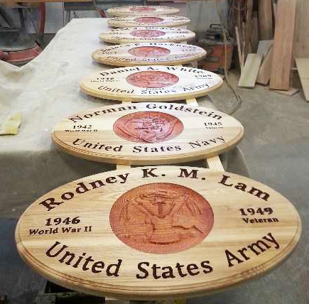 Honoring vets, Dennis has made hundreds of commemorative Service plaques. Each one takes him 8 hours or so.